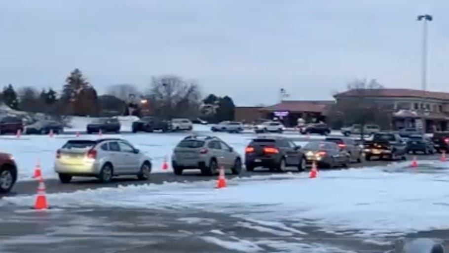 WATCH: Hundreds of cars line up in Sterling Heights for free COVID-19 testing