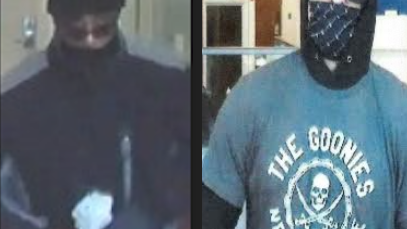 FBI investigates 2 suburban bank robberies