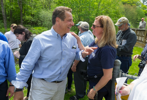Gov. Cuomo and Virginia Limmiatis at the May 2017 event in Oswego County