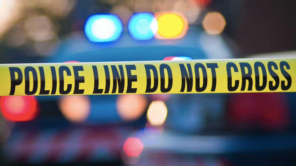 Woman, 59, killed in crossfire between security guard, gunman: police