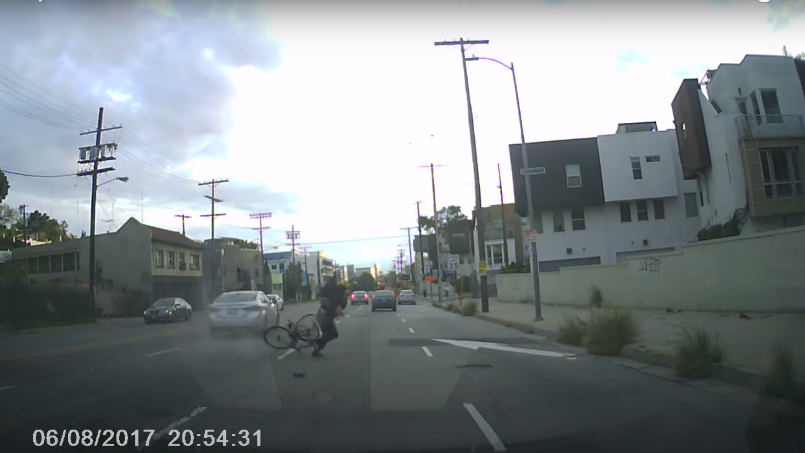 WATCH: Bicyclist barely escapes with life after hit-and-run driver crushes bike