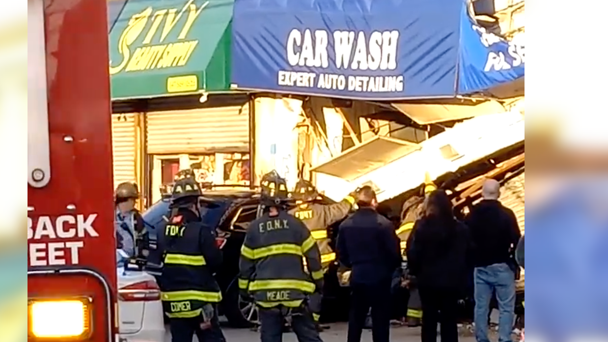 Vehicle crashes into Queens car wash killing child, injuring 2 others