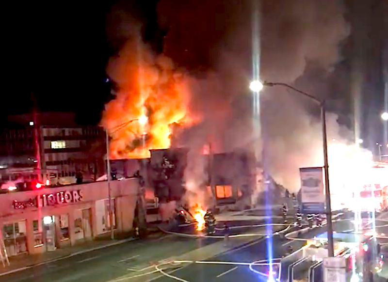 The fire started to spread to a liquor store, but firefighters were able to stop it