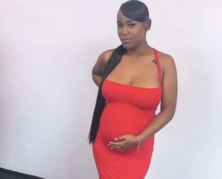 pregnant woman in red dress