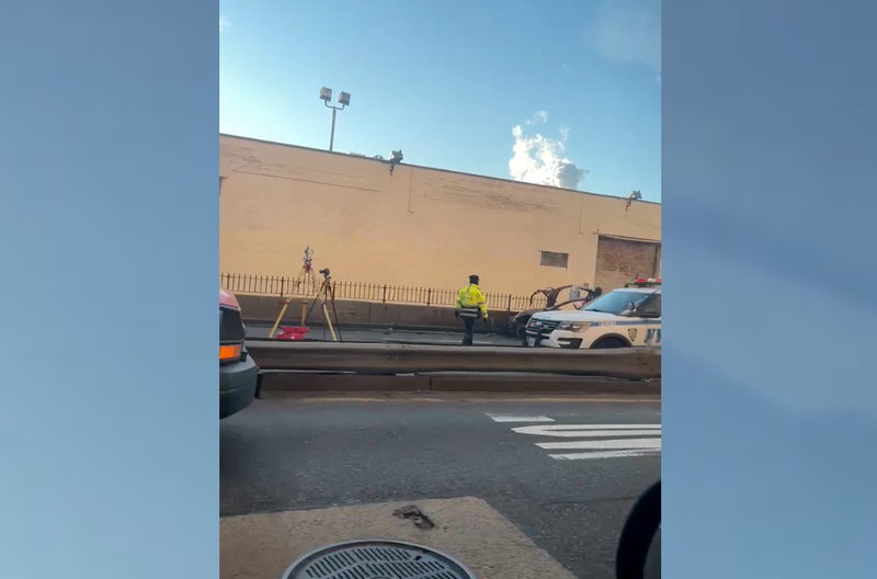 Police investigate at the scene of the crash at daybreak