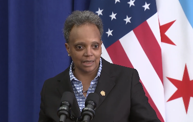 Lightfoot at lectern
