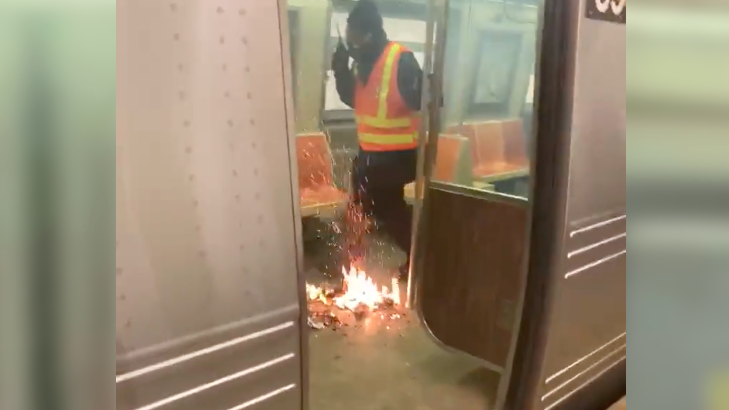 VIDEO: MTA employee puts out fire on Upper Manhattan subway train