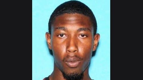 Police seek 'armed and dangerous' gunman accused of killing man at Detroit mental health facility