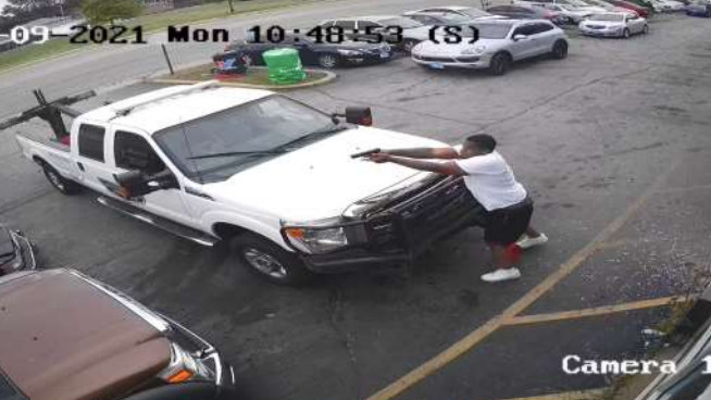 Feds announce charges against 3 men in parking lot shootout
