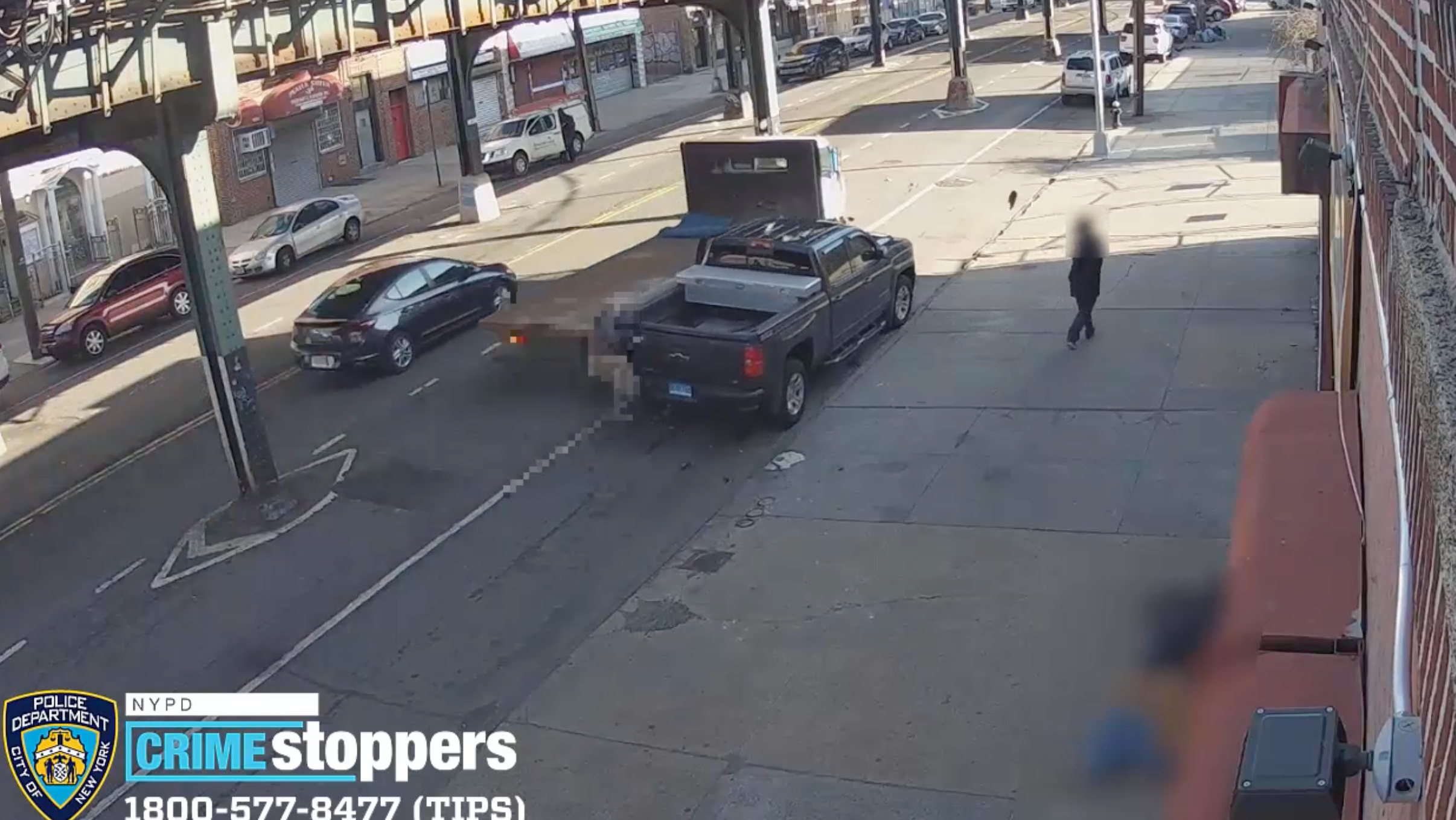 Man critically injured after being hit by stolen flatbed truck, suspect sought