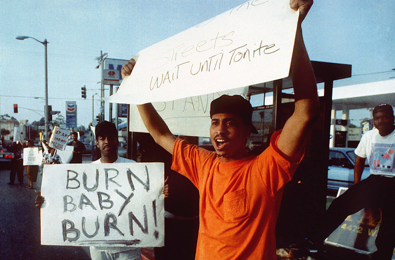 Residents of the West Adams (Western Ave. and Adams Blvd.) district protest the verdict of the police officer who was acquitted of beating Rodney King on April 29, 1992, in Los Angeles.