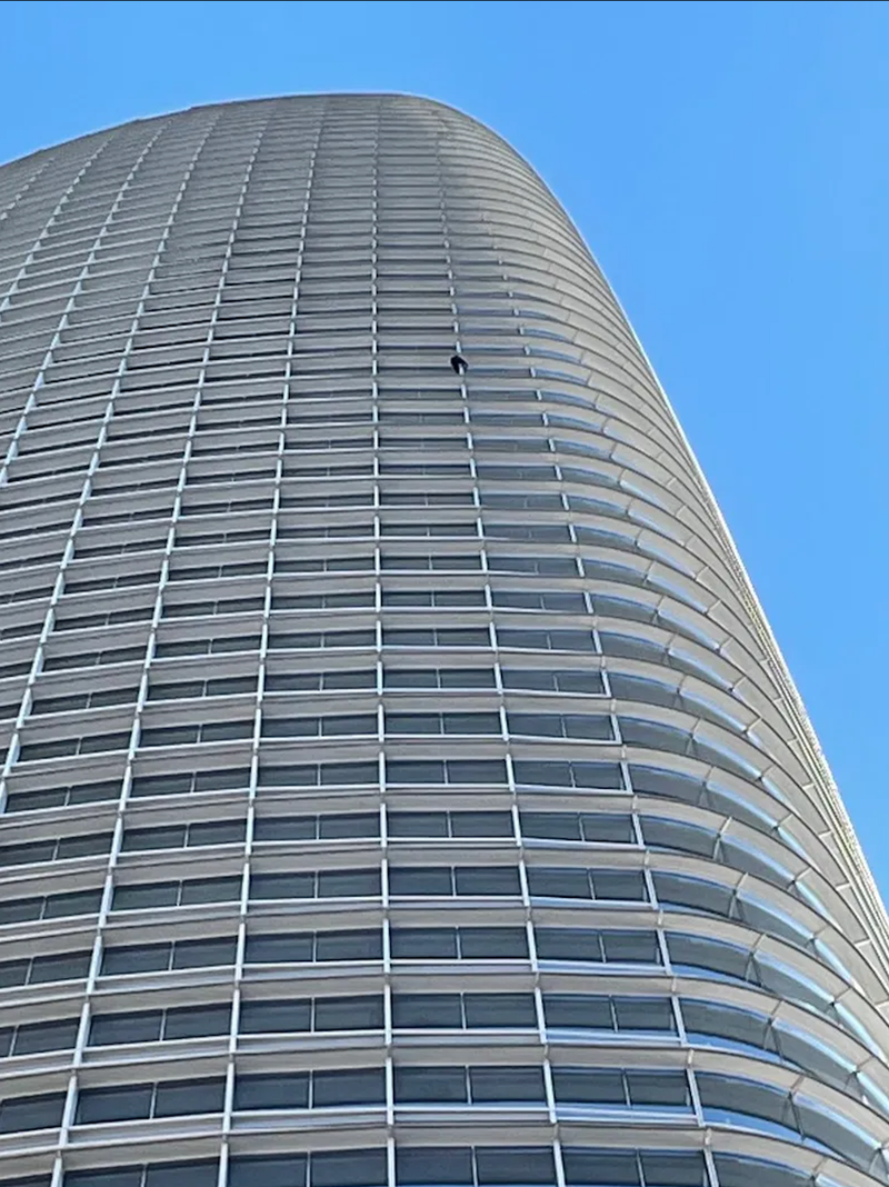 Man climbing San Francisco's Salesforce Tower.