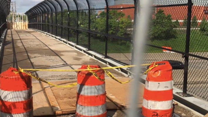Downtown Detroit pedestrian bridge closed after man claims he fell through