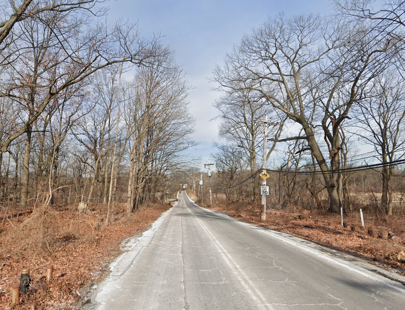Two people were found dead in a burning car on Shore Road in the Bronx early Monday morning