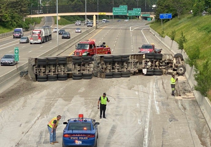 Overturned gravel hauler 