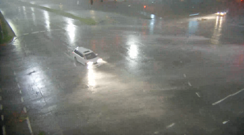 High winds rake across an intersection in Overland Park