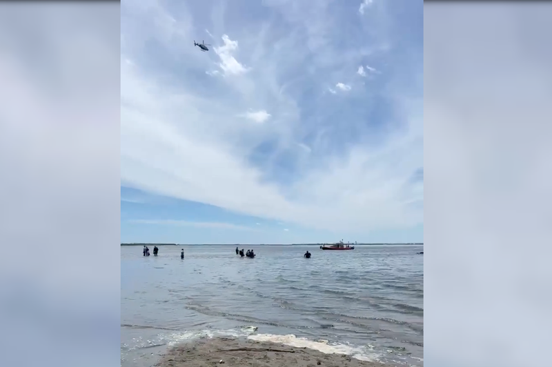 Helicopters and rescue boats were seen near the North Channel Bridge in Jamaica Bay