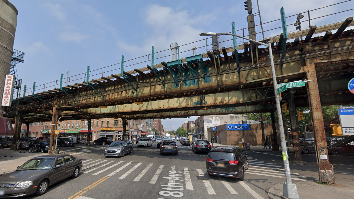 Garbage truck crashes into pole in Brooklyn, driver critical