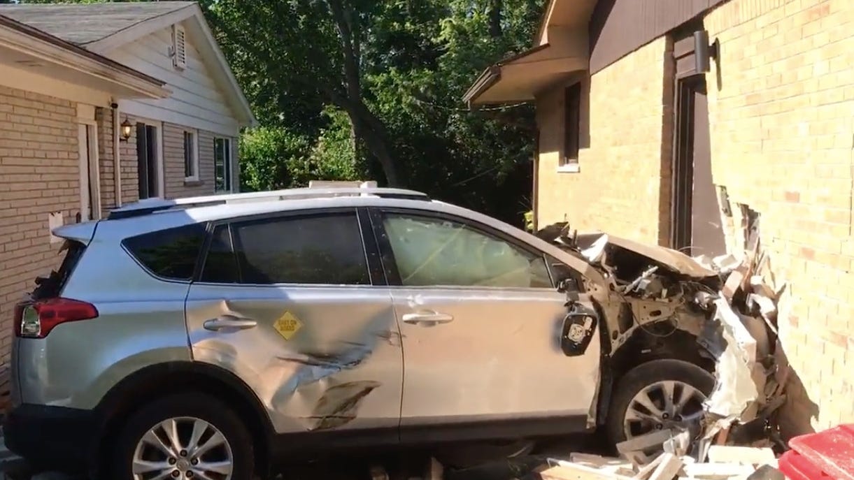 Elderly driver crashes into two homes after hitting car in Oakland County