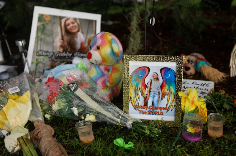 A sign at a roadside memorial honors the death of Gabby Petito on September 24, 2021 in Blue Point, New York.