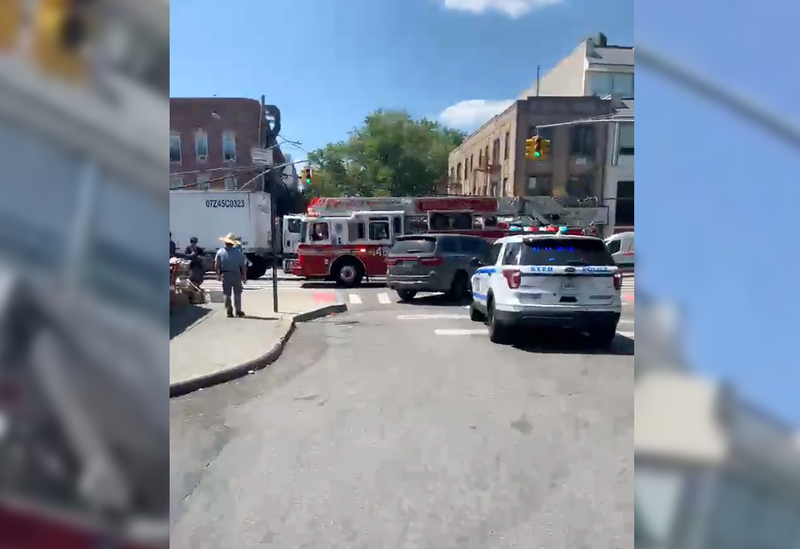 Police and EMS at the scene of the fatal crash on Fort Hamilton Parkway in Borough Park on Thursday afternoon