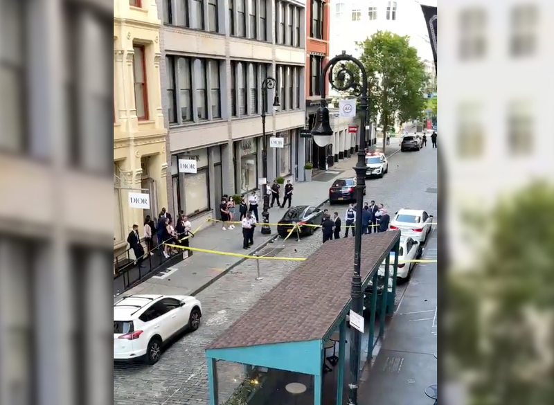NYPD officers were seen investigating on Greene Street following the shooting around 5 p.m. Monday