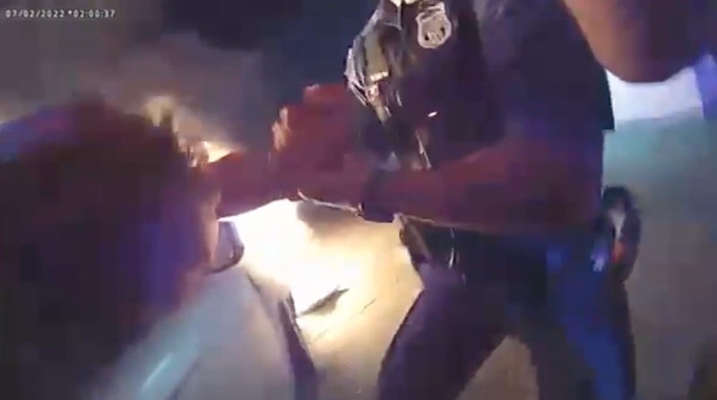 Officers pulling man from vehicle 