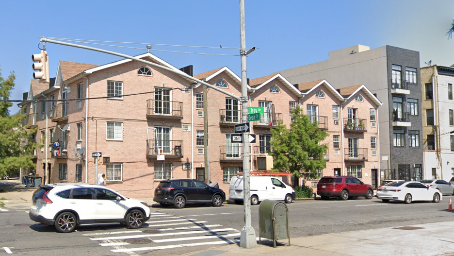 Woman hit by stray bullet while lying in bed at Brooklyn home