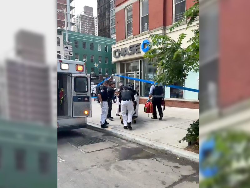 Video shows the victim being rushed out of the Chase Bank at E. 86th Street and Second Avenue on the Upper East Side Friday morning