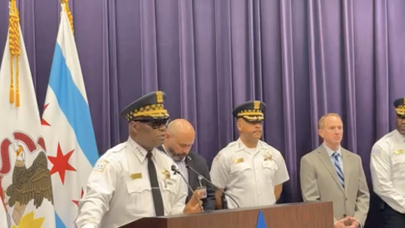 2 wounded, including bystander, in police shootout; suspect at large