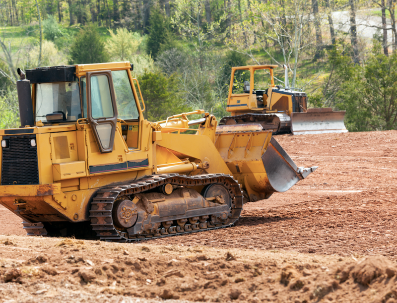 Bulldozer moving earth