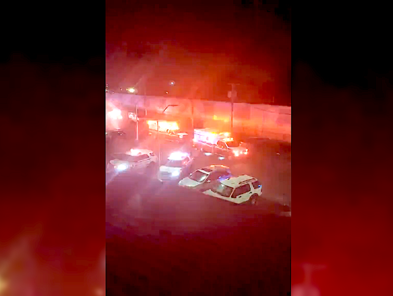 First responders at the scene of a shooting in Far Rockaway that left two men wounded Sunday night