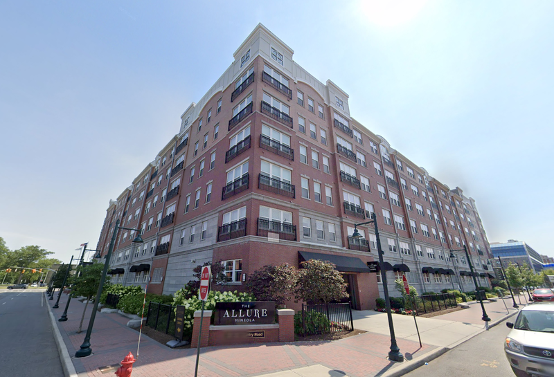 The woman was found dead at The Allure Mineola, where currently listed one-bedroom apartments start at over $3,500