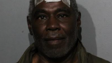 Michigan man charged with sexually abusing boy in bathroom stall: police