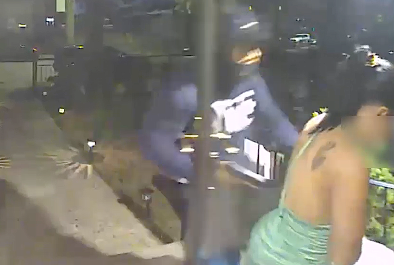 Video shows the men forcing their way into the woman's Rosedale home at gunpoint last month