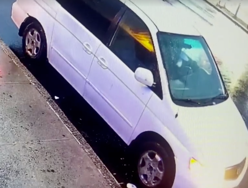 The masked robber's white minivan.