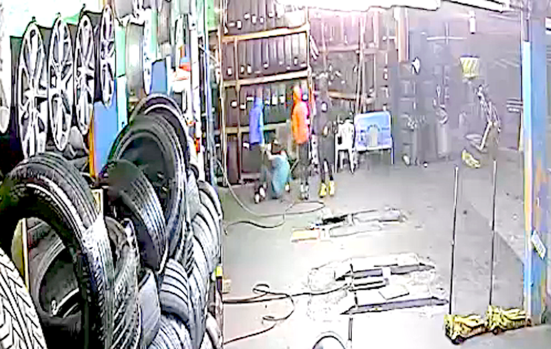 Video shows a man being forced to the ground at gunpoint at a Bronx tire shop on Aug. 25