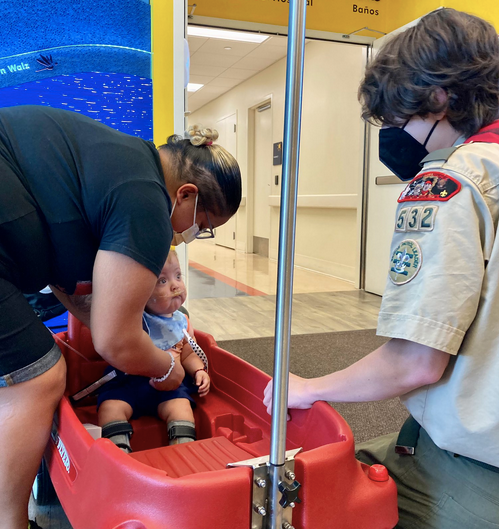 Boy Scout delivers wagons