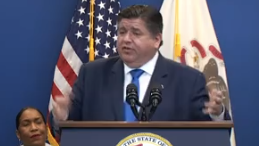 Pritzker pushes back at suburbs complaining about migrant overflow