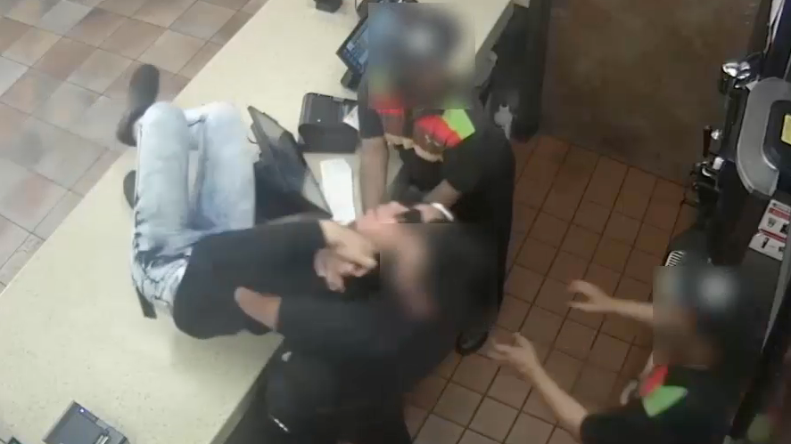 VIDEO: Bronx Burger King workers tangle with customer who dove over counter for $250