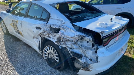 Tanker truck clips state trooper's vehicle