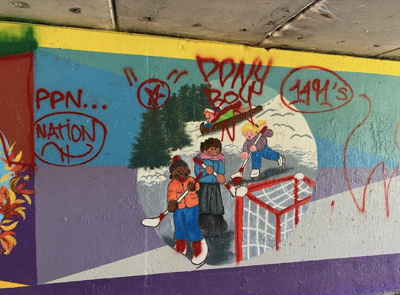 vandalized mural