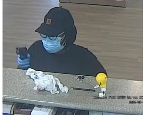 Suspect caught on camera in Warren bank robbery