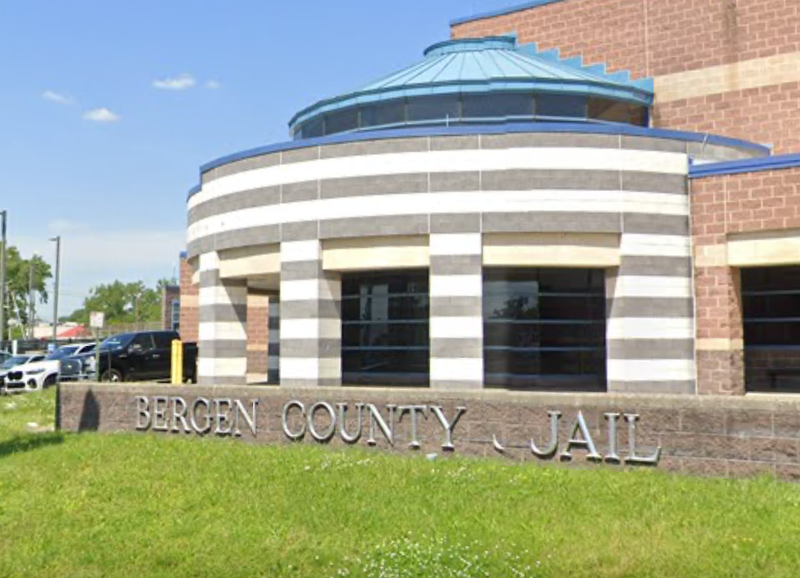 A former corrections officer at the Bergen County Jail in Hackensack alleges she was sexually harassed and was suspended, then fired, after she complained.