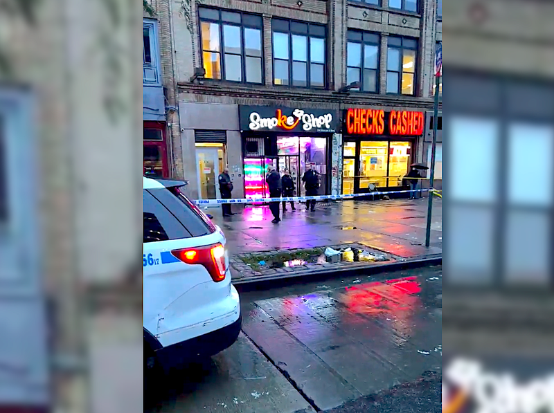 Investigators blocked off an area of sidewalk on Lenox Avenue following the shooting Tuesday morning