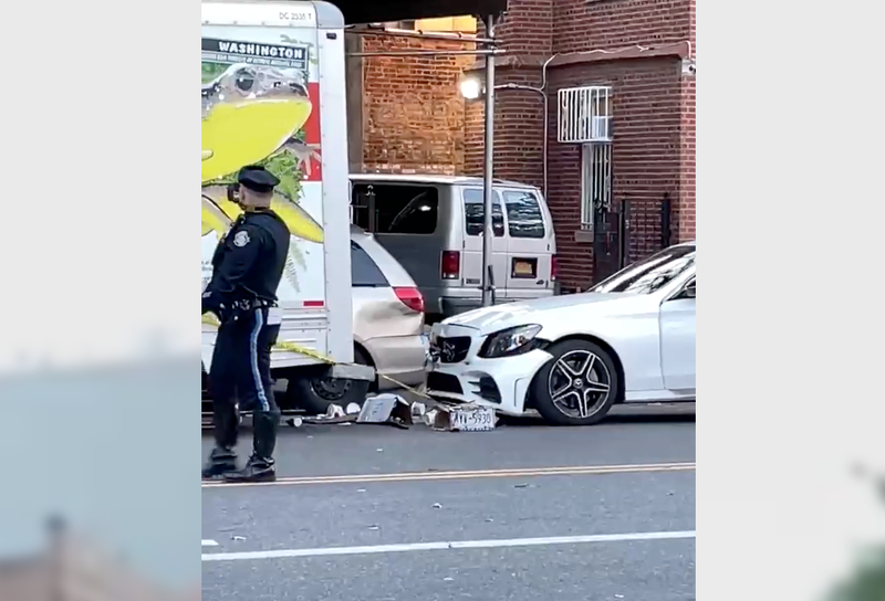 The man was pinned between the U-Haul truck and the Mercedes