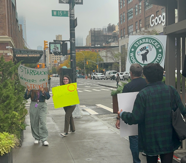 Starbucks worker on strike at the city's flagship Reserve store.