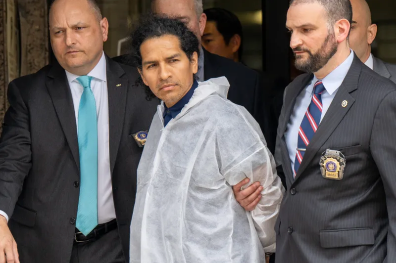 David Bonola is taken from the NYPD's 112th Precinct stationhouse in Queens on April 21, 2022. 