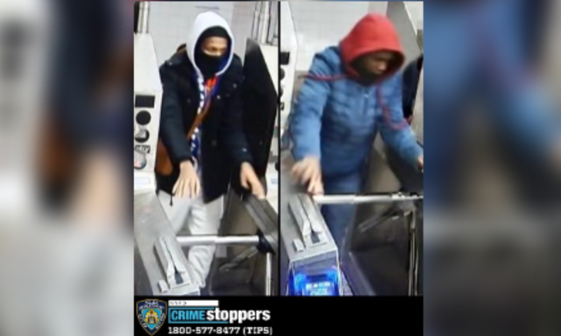 Suspects wanted for robbing two men on subway.