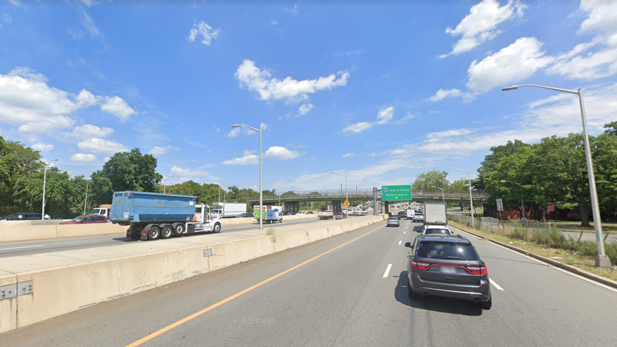 Man fatally struck by multiple vehicles while crossing Grand Central Parkway